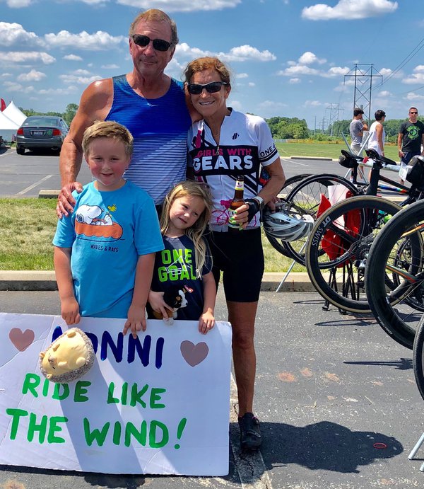 Tanny Crane her husband John Wolff and grandchildren at 200 Mile Finish at Bevelhymer Park 2019.jpg