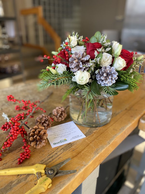 Bloomtastic - Red and White Roses, Ranunculus and Pine Cones.jpg