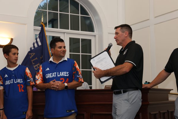 Head Coach Tim Bush accepts a proclamation from New Albany City Council on September 19, 2023.JPG